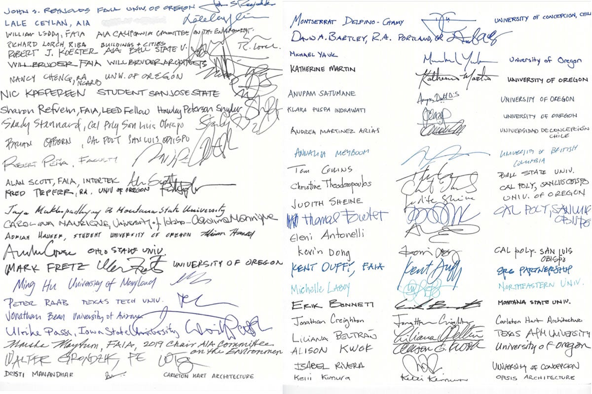 Image of two sheets of paper filled with signatures