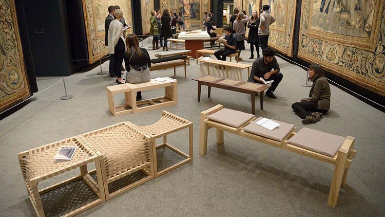 critique of benches on display at the JSMA
