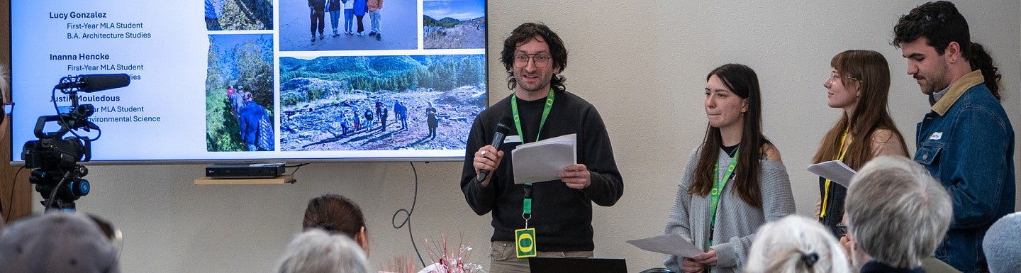 Photograph of the MLA students presenting to Rockaway Beach residents. 