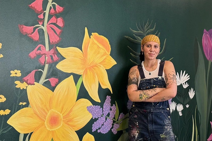News header image of mural artist. 