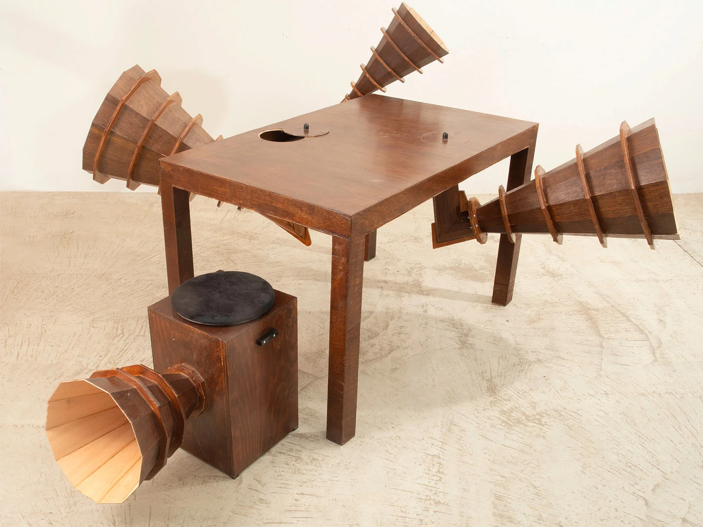 Photograph of an art piece called "Table for A Trio in Four Courses". 