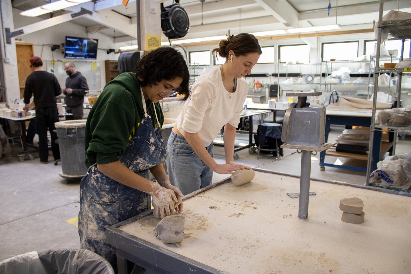 Students work in the ceramics classroom. 