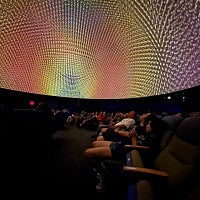 Kevin Kripper's work is shown on a domed screen. Decorative. 