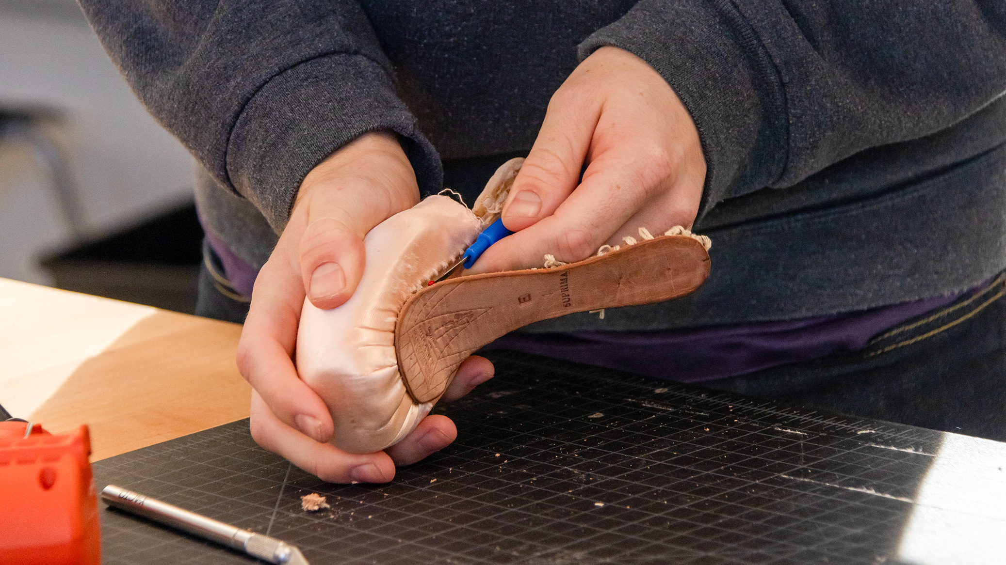 Student redesigning a ballet pointe shoe