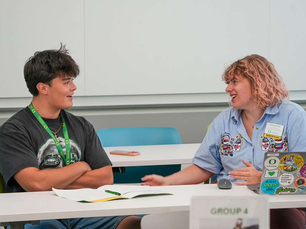 An advisor talking to a student