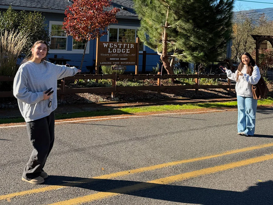 UO students Natalie Cohen and Julie Gomez visit the Westfir Lodge.
