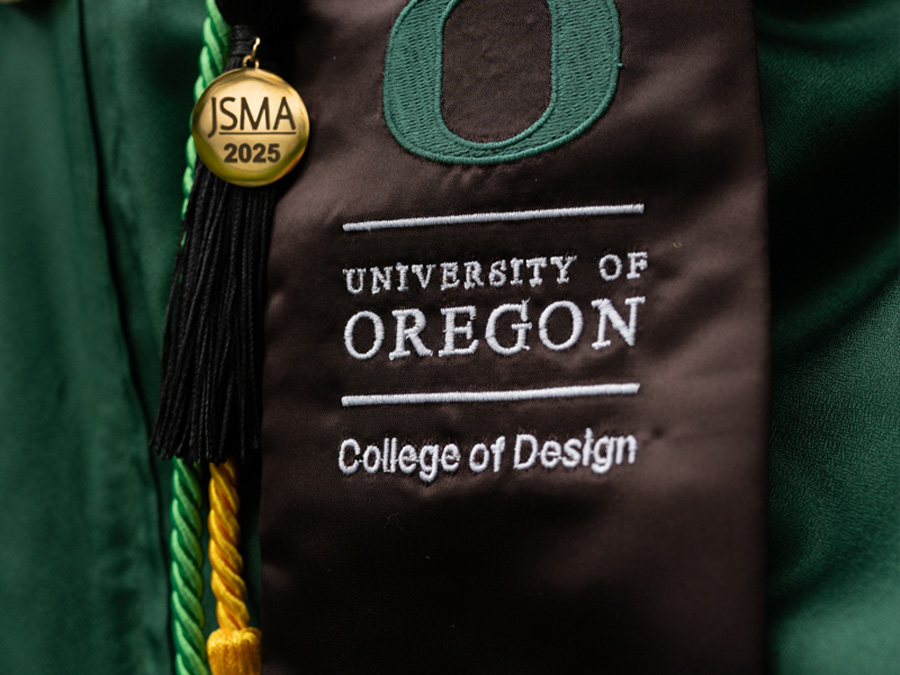 A College of Design graduation stole, cords, and JSMA emblem