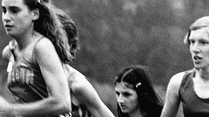 Women compete in a cross-country race.