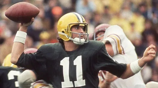 Dan Fouts throwing a football