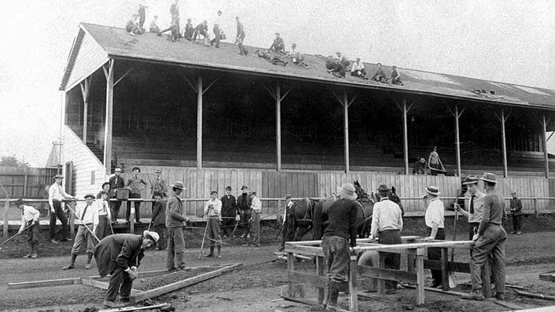Historical photo of men working on the construction of Hayward Field.