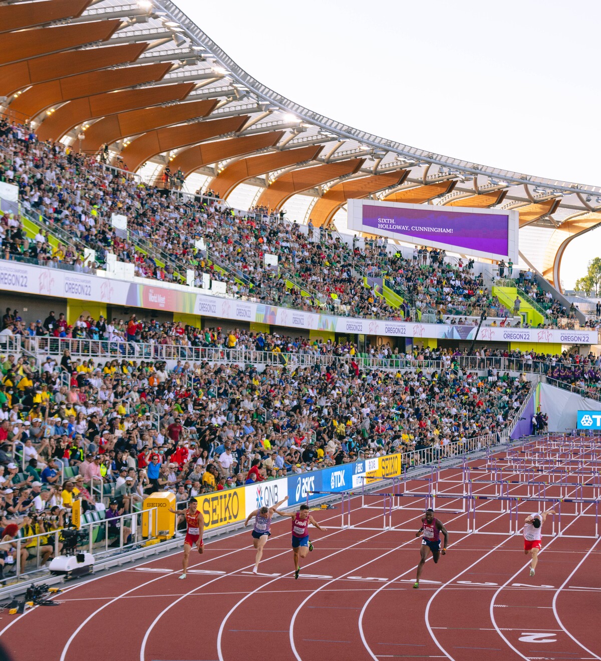 Runners compete before a full crowd at Hayward Field.