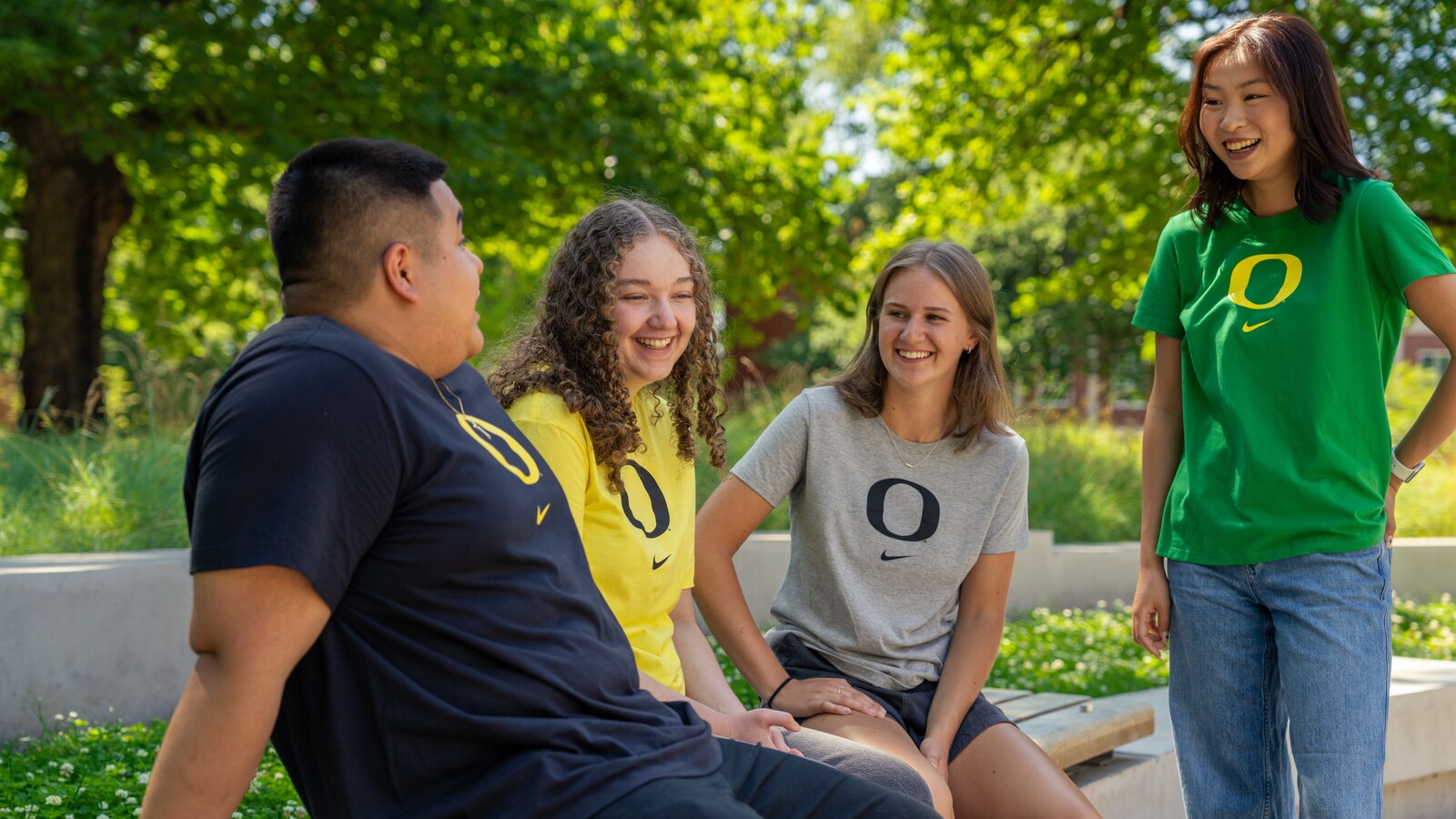 Students gather outdoors on campus.