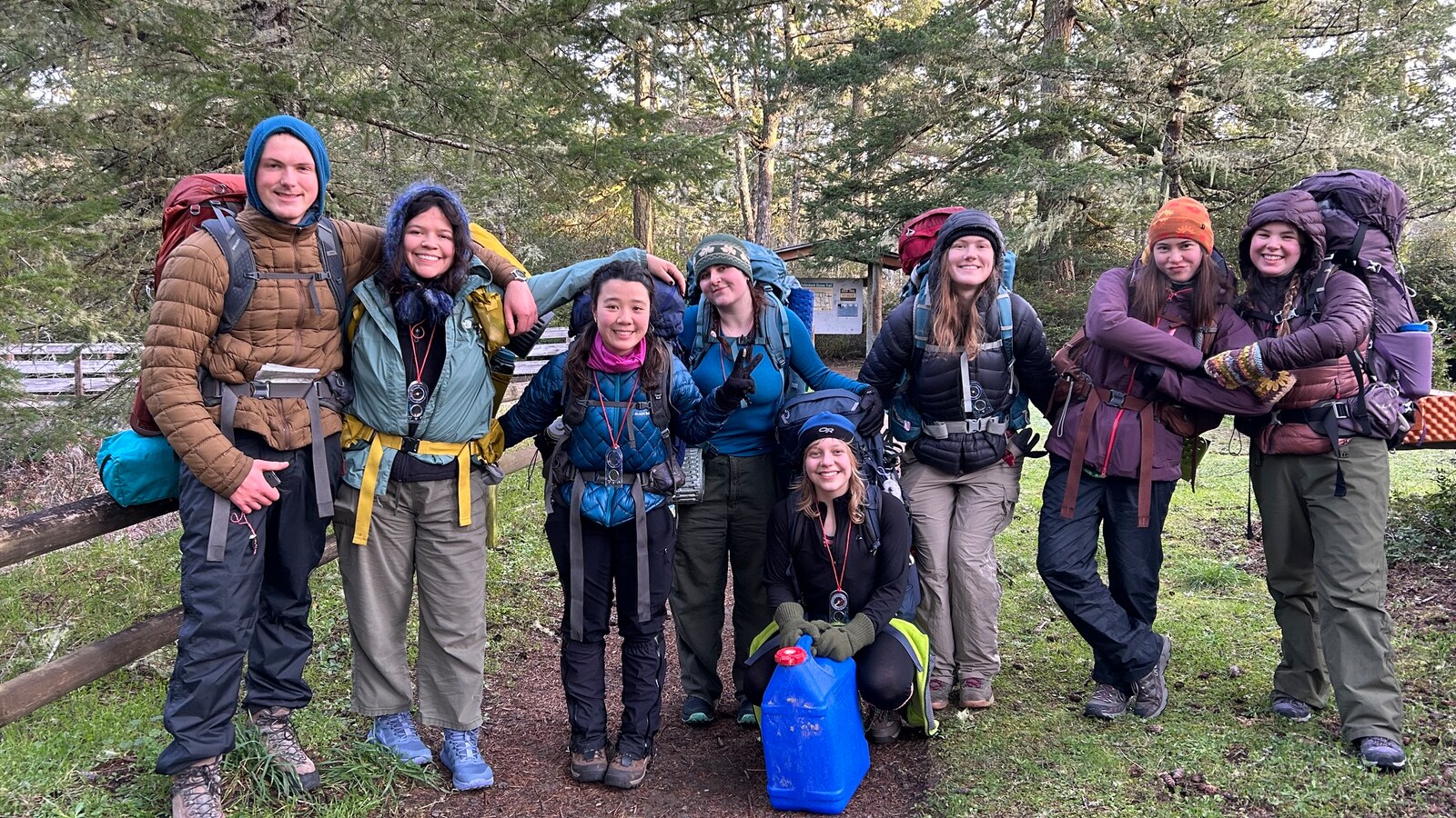 Students pose together before an outdoor trip.