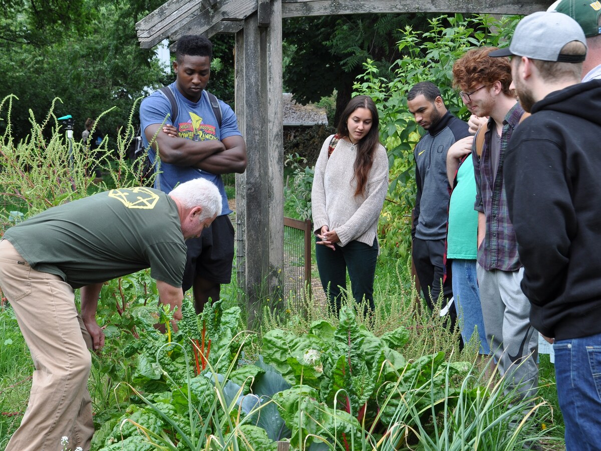 Students learn together in the Urban Farm garden.