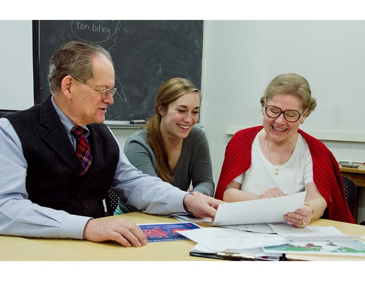 Drs. Bradshaw and Holzapfel working with a student