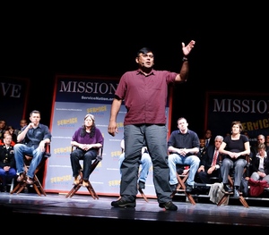 A man performing on stage