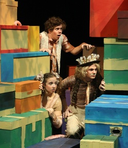 Students acting on stage