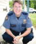 A woman in a police officer uniform