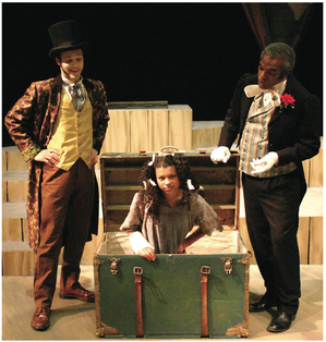 Students in costume act on stage