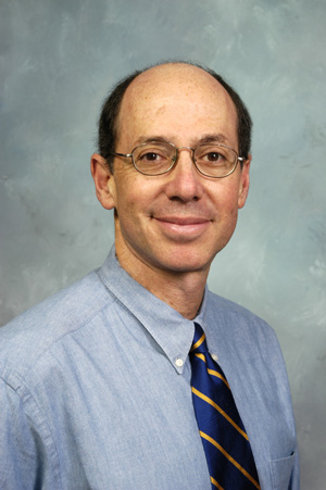 A man in a dress shirt and tie