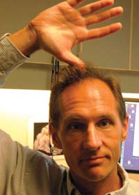 A man holding up his arm 