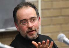A man speaking into a microphone