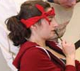 Students work out problems in a classroom