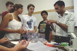 Students in a lab with a professor