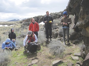 Students on a rock formation outdoors