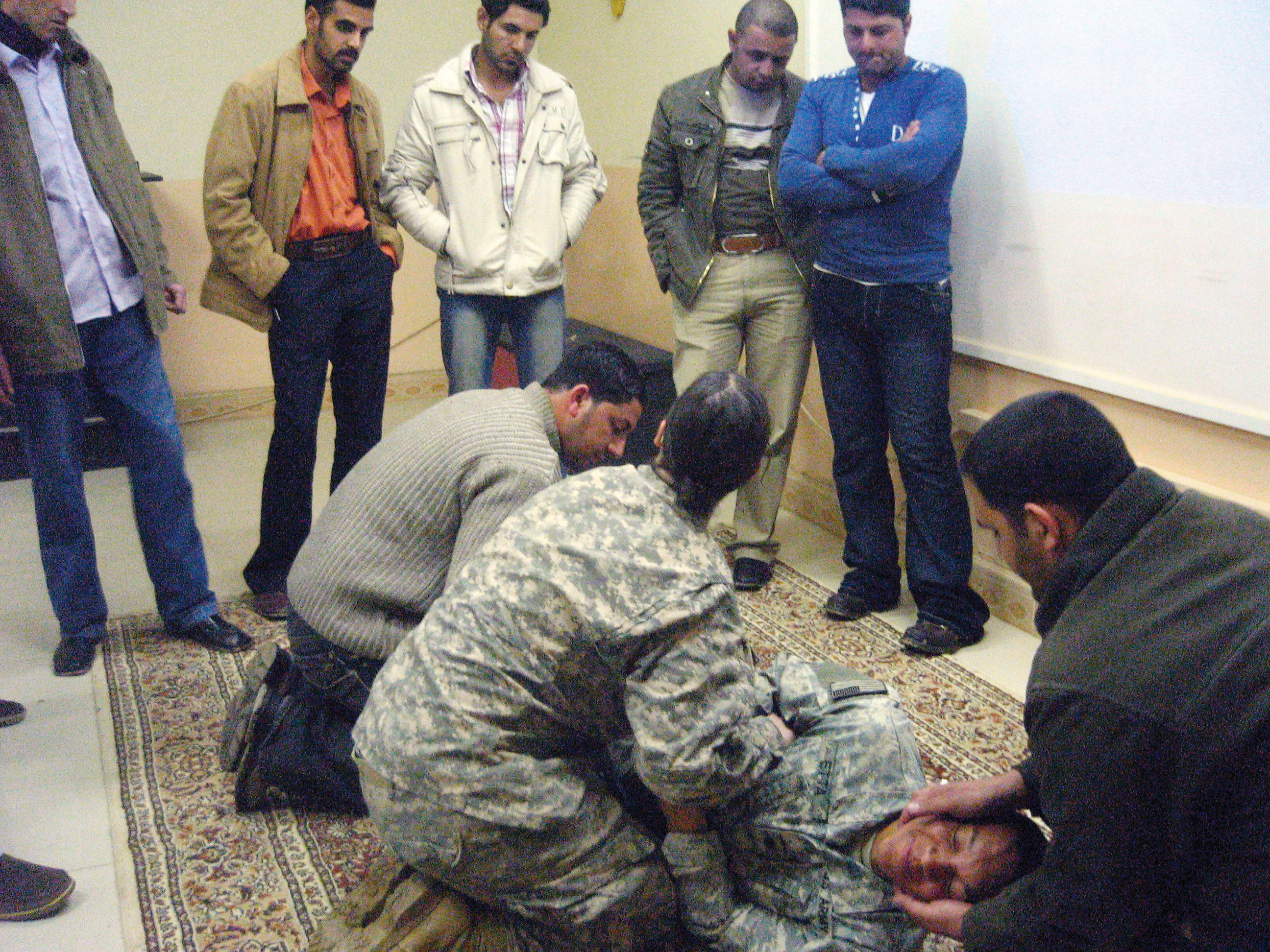 EttaByron Assisting Wounded.jpg
