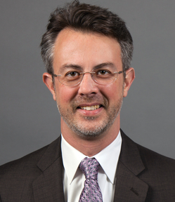 A man in suit and tie