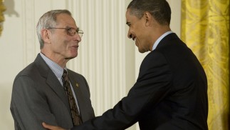Professor Emeritus Michael Posner receives award from President Obama