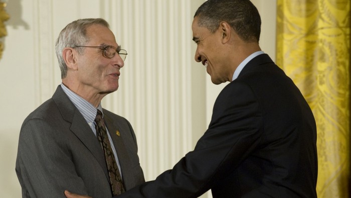Professor Emeritus Michael Posner receives award from President Obama