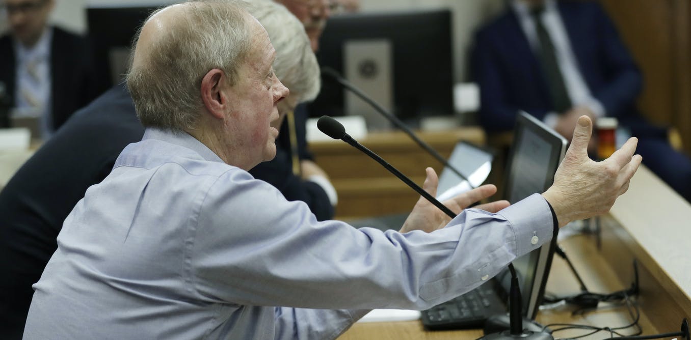 man talking into microphone