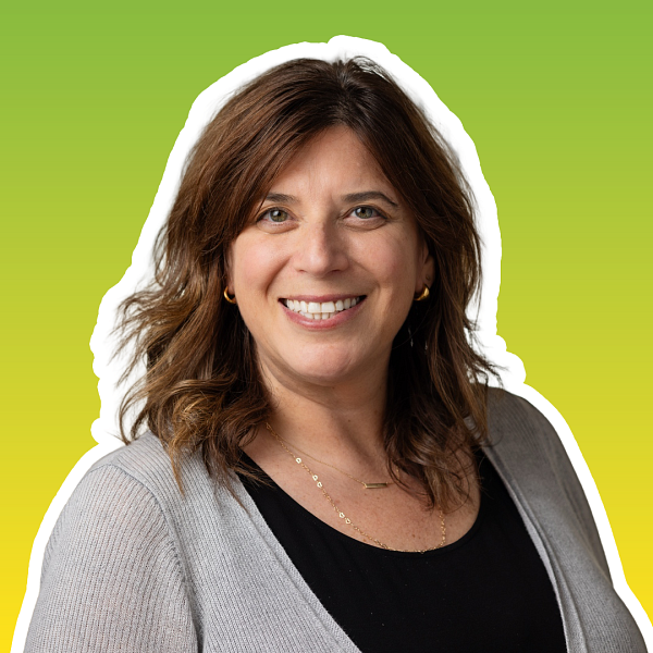 Portrait of a smiling woman with a gradient in the background