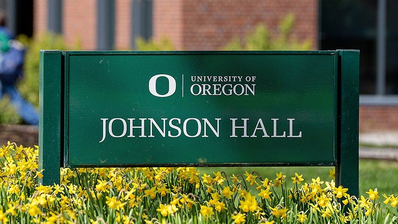 green building sign identifying Johnson Hall