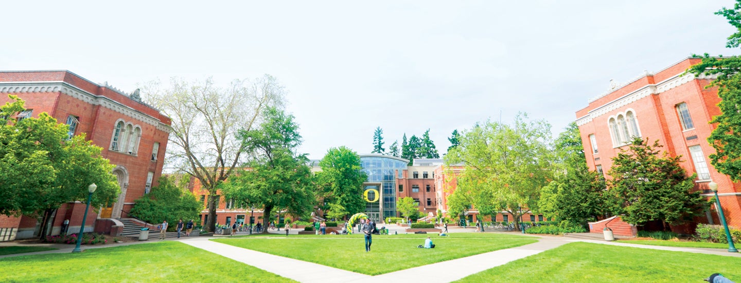 Grassy Area on University of Oregon Campus with Yellow O on Lillus Business Center.