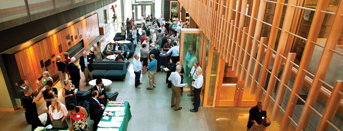 Community gathered in hallway of Ford Alumni Center.