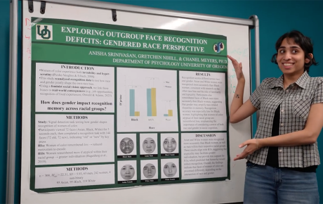 STEAM Fellow Anisha Srinivasan shows a research poster she created with funding from CSWS. 