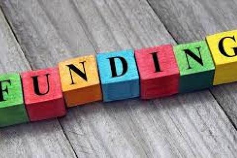 Colorful blocks that read "Funding"