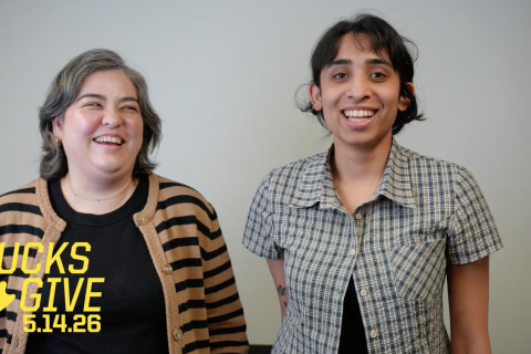 A faculty member and student research laugh during an interview about the STEAM summer fellowship.