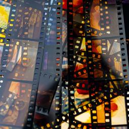 Clips of celluloid film in a pile.