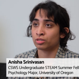 Video still of a female undergraduate researcher of South Asian descent being interviewed.