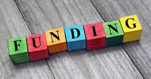 Colorful blocks spelling out "funding"