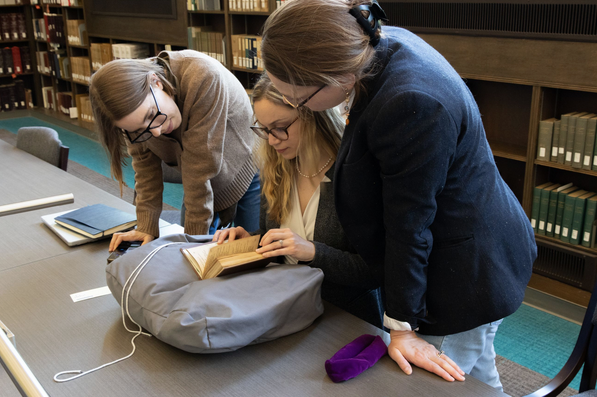 Picgtured from left: Data management librarian Erin Winter, research assistant Michele Pflug, and principal investigator Mattie Burkert.