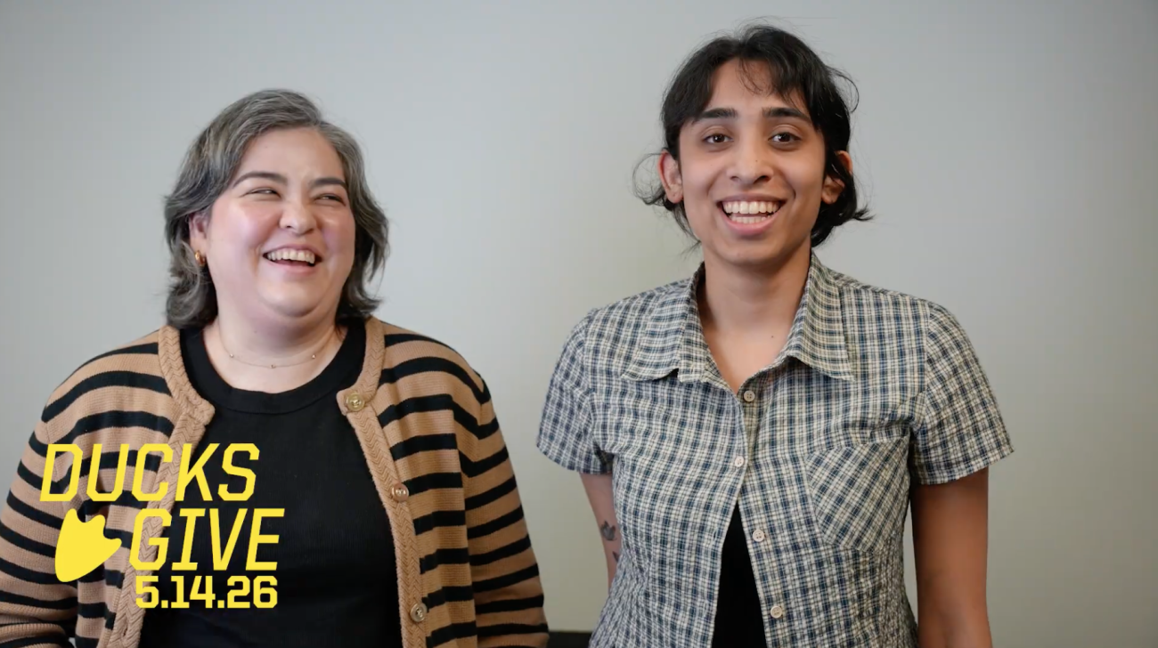 A faculty member and student research laugh during an interview about the STEAM summer fellowship.