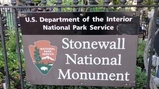 A sign designating the Stonewall National Monument.