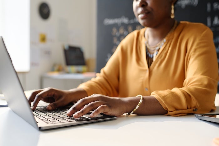 Teacher at a computer