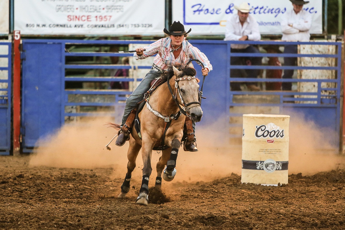 Woman rides horse at Frolic Rodeo in Philomath