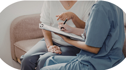 Doctor going over chart with patient